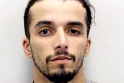 Accidentally freed prisoner locked up for biting police officers