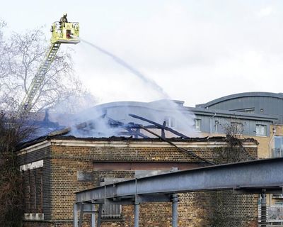 Fire near rail line in north London brings travel disruption across England