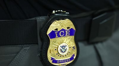 ‘I almost broke down right then’: ICE agents shatter window during arrest and leave behind something that has bystanders breaking down