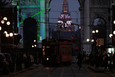 Milan’s historical trams at night as the city gears up for the Winter Olympic Games, in photos
