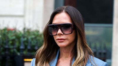 Victoria Beckham confirms cerulean blue as this season's standout shade in double breasted blazer and suit trousers