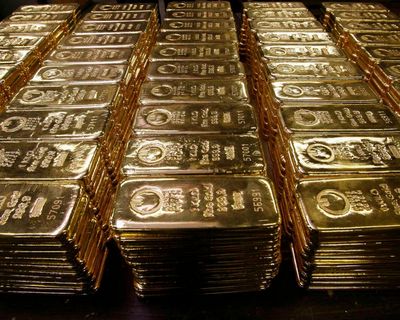 Gold and silver prices seesaw as FTSE 100 hits record high
