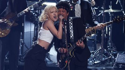 APT with a twist: Bruno Mars plays a Gibson Les Paul as he and Rosé deliver a hard rock version of their 2024 hit at the Grammy Awards