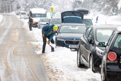 Snow and flood warnings issued to parts of UK