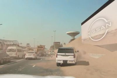 Viewers left baffled at mind-bending Nissan ad as desert sand spills out of Dubai highway billboard