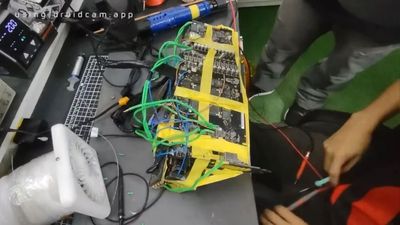 Frankenstein RTX 5070 Ti with an RTX 2080 Ti PCB breaks world record with extreme modding — card was damaged, salvaged with AMD donor parts and lots of soldered wires and tape