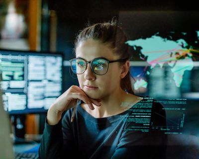 Women in tech and finance at higher risk from AI job losses, report says