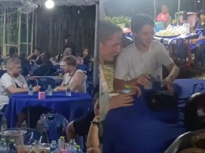 Foreign tourists mistake Thai funeral for food court