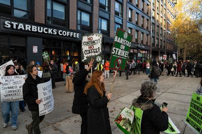 Striking Starbucks workers urge customers to delete coffee chain’s app