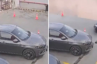 Moment huge sinkhole swallows petrol station with customers inside