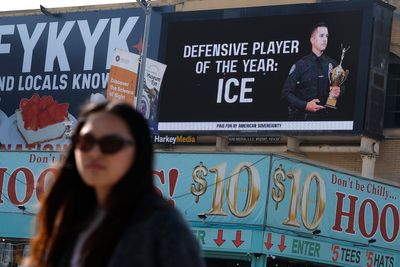 Billboard with pro-ICE messages appears near the site of Super Bowl LX