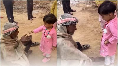 The elderly man's reaction to the little girl's kindness is priceless; watch the video.