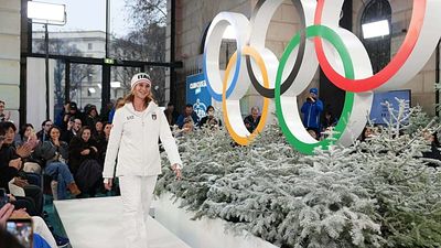 Olympians turn runway models as IOC unveils teams' uniforms