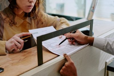 7 Ways Your Bank Makes “Free Checking” Cost $15 a Month