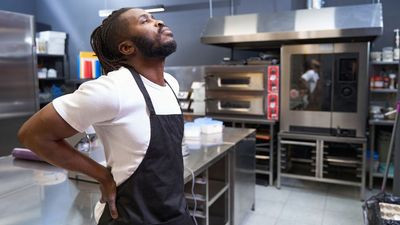 I asked an occupational therapist why being on my feet all day makes my back hurt—here’s what she had to say