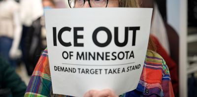 Why corporate America is mostly staying quiet as federal immigration agents show up at its doors