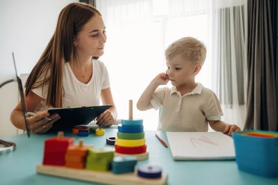 Speech Therapists Beg: Throw Away These 5 “Talking” Toys (They Kill Conversation)