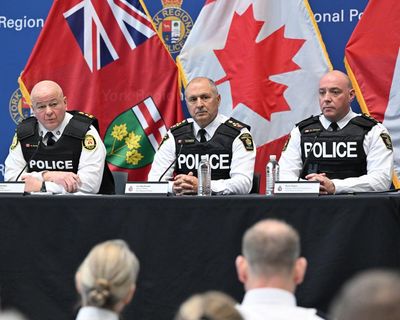 Eight current and former Toronto police arrested in organized crime inquiry