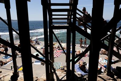 ‘People on top of people’: Sydneysiders flock to netted beaches and ocean pools after shark attacks