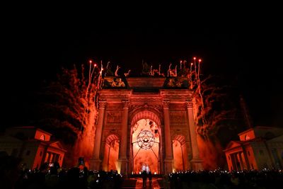 Winter Olympics opens in style with unprecedented double cauldron lighting
