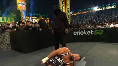 WWE Fans Want To Know Who The Masked Man Is, And I Have Some Guesses