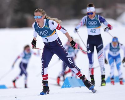 Early crash disrupts US favorite Jessie Diggins in race for skiathlon gold
