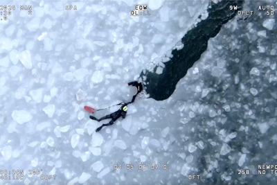Three pulled from frozen waters in dramatic police helicopter rescue