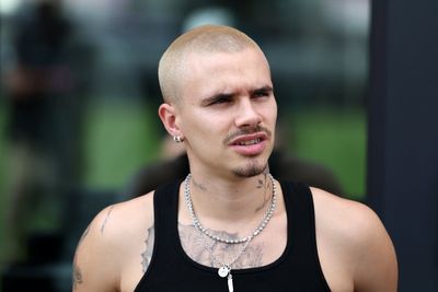 Romeo Beckham picks his side in family feud with bold new tattoo
