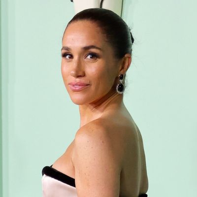 Meghan Markle Makes a Dramatic Entrance in a Harbison Studio Strapless Gown and Floor-Length Cloak
