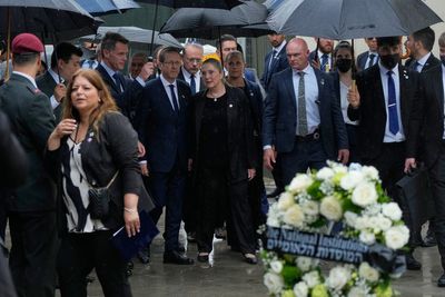 Israel's president visits Sydney's Bondi Beach massacre site and meets victims' families