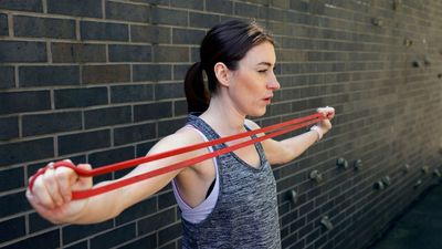 No gym, no worries—use this six-move resistance band routine to build full-body strength and mobility