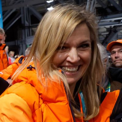 Queen Máxima Upgrades Her Orange Puffer Coat With a Classic Chanel Bag at the Olympics