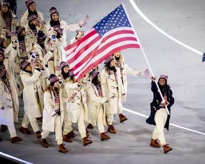 Pride and unease: US Winter Olympians navigate politics, patriotism and Trump attacks