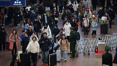 Lunar New Year: Travellers brave 30-hour train journeys with record 9.5 billion trips expected