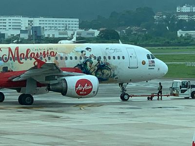 Artist accuses AirAsia of using his mural on plane without consent