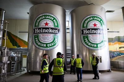 Beer giant Heineken to axe up to 6,000 jobs