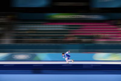 Photos show athletes as a blur of motion at the Milan Cortina Winter Olympics