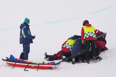 Snowboarder stretchered off course after horror crash at Winter Olympics