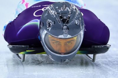The Ukrainian daring the Winter Olympics to disqualify him over war tribute helmet