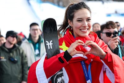 At 22, Olympic skier Eileen Gu is worth over $20 million. She’s juggling brand deals and sports with school. And she urges Gen Z not to wait until they’re ‘older’ to start