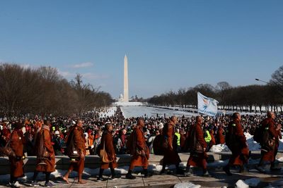 Monks bring balm for America’s wounds as Washington cheers peace odyssey