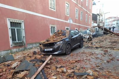 Portugal floods force 3,000 evacuations as motorway collapses and interior minister resigns