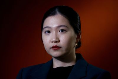 Father of exiled Hong Kong activist convicted in unprecedented insurance case under national security law