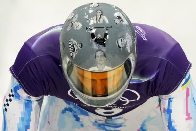 Ukrainian racer says Winter Olympic ban over war victim helmet a win for Russian propaganda