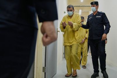 IS suspects transferred from Syria to Iraq are interrogated in a Baghdad prison