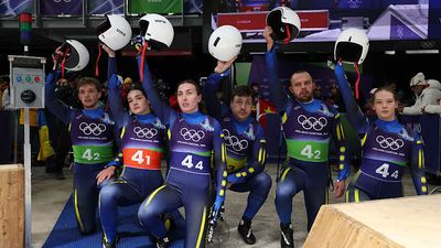 Ukrainian Lugers Kneel in Protest Hours After Teammate Is Disqualified Over Helmet