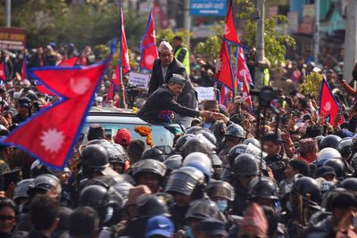 Thousands rally in support of Nepal's former king and call for monarchy's return