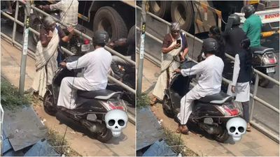 Woman confronts a motorist riding through the pedestrian footpath; gains appreciation from the transport minister