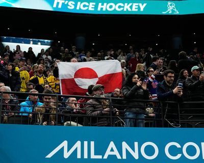 ‘We are Europeans’: fans fly Greenland flag during Olympic US-Denmark ice hockey game