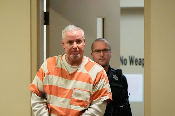 Opening statements to start in the trial of a Georgia high school shooting suspect's father